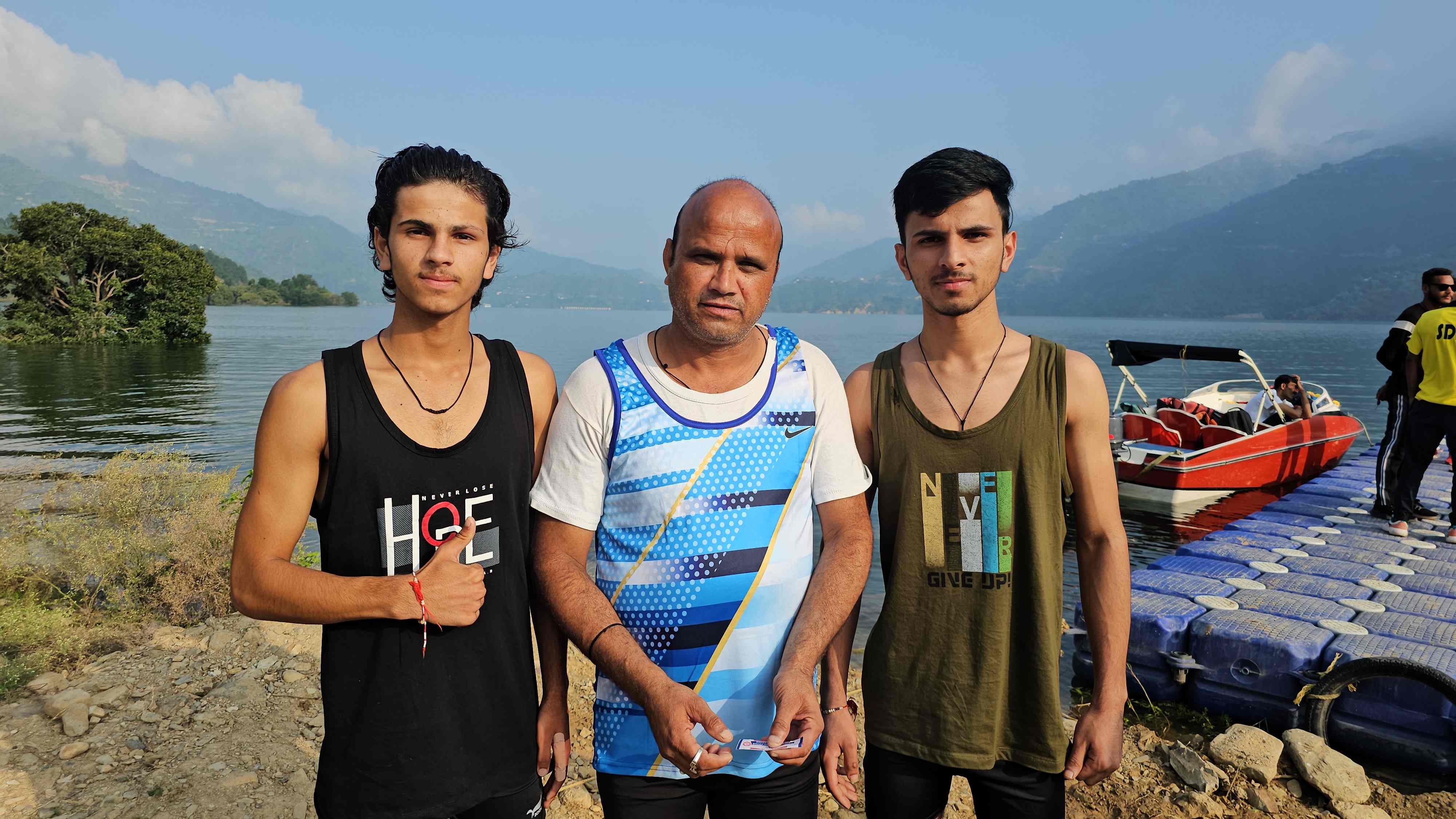 Father And Sons Swimming Record In Tehri Lake