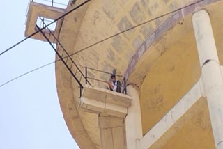 Youth Climbed atop Water Tank