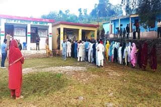 Voters lineup to exercise their franchise in the second phase of J&K Assembly Polls