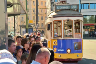 celebrating 123 years, Lisbon's historic trams attract millions of tourists, but residents complain they are now reserved for visitors, making local transport challenging.