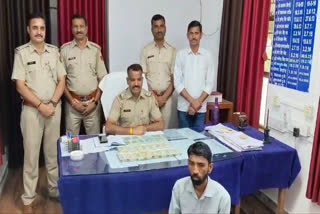 Rs 7 lakh and 50000 cash seized from a bike rider