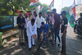 CONGRESS STARTED SOWING WHEAT ON ROAD POTHOLES