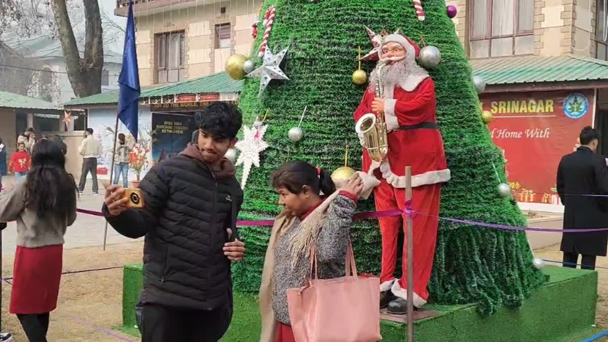 Members of the Christian community celebrate Christmas at the Holy Family Catholic Church in Srinagar, Jammu and Kashmir