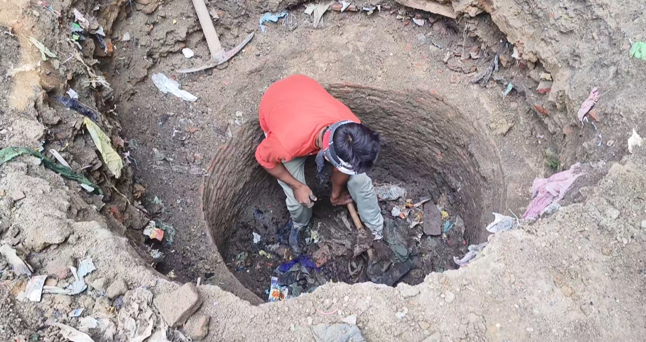 A labourer digs of the well in Sambhal