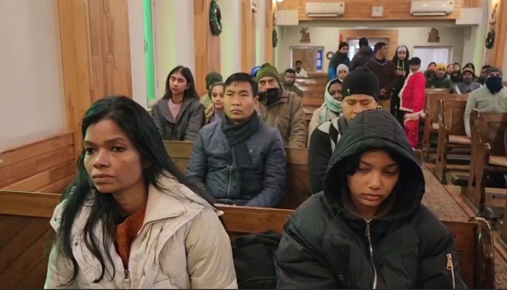 Members of the Christian community celebrate Christmas at the Holy Family Catholic Church in Srinagar, Jammu and Kashmir