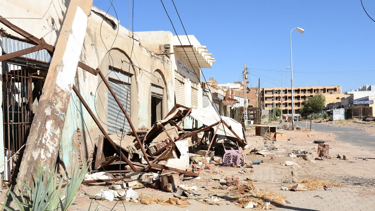 A picture taken on January 19, 2025 shows a general view of damaged shops and houses in Sudan's Al-Jazira state capital Wad Madani following its takeover by the army from paramilitary Rapid Support Forces (RSF).