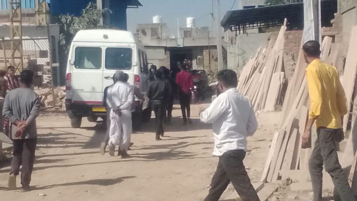 The bodies of the children being ferried in a ambulance