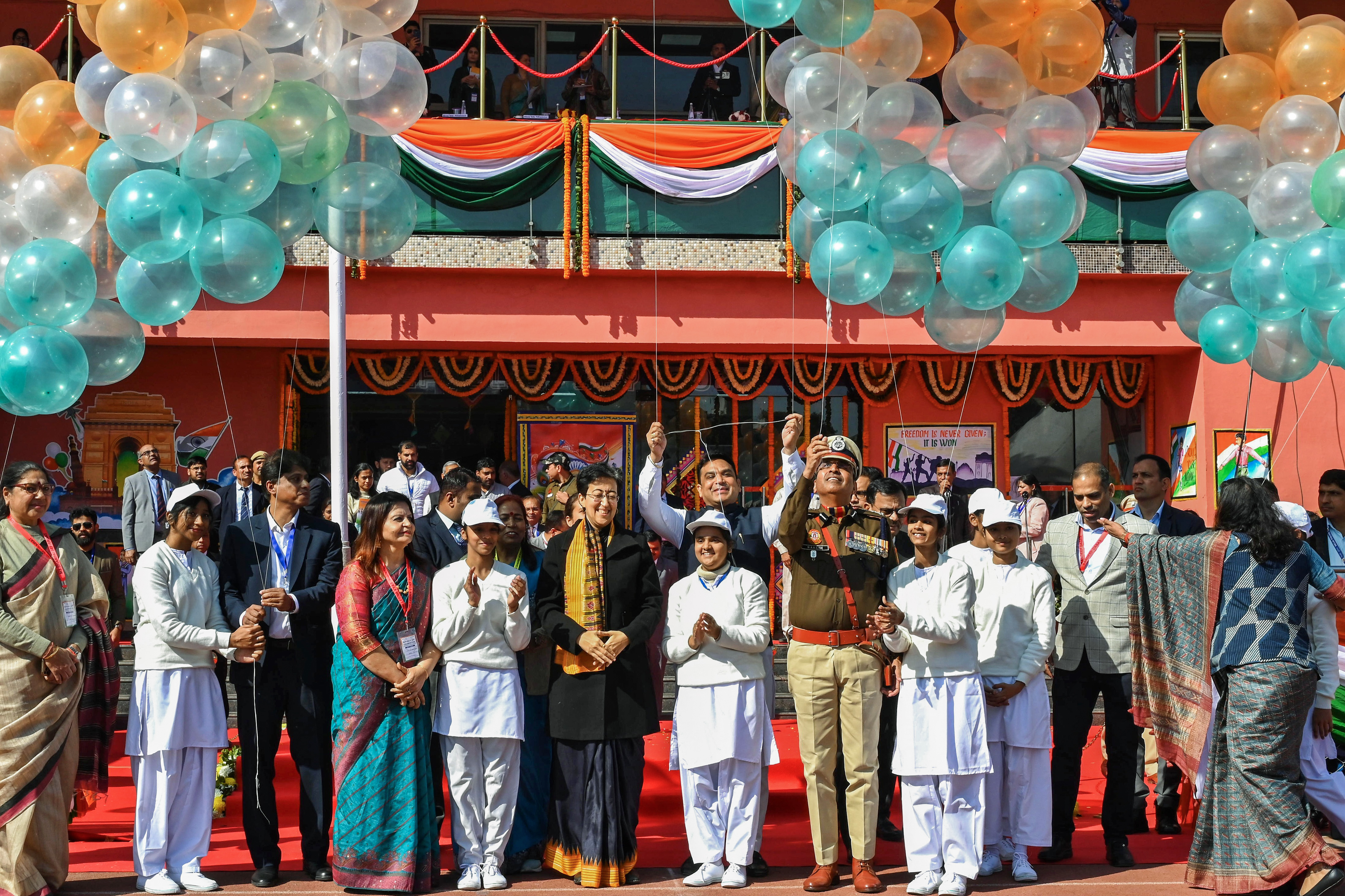 Delhi Chief Minister Atishi attends Republic Day celebrations, at Chhatrasal Stadium in New Delhi on Saturday.