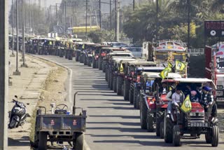 Farmers take part in a tractor march in Amritsar on Sunday.