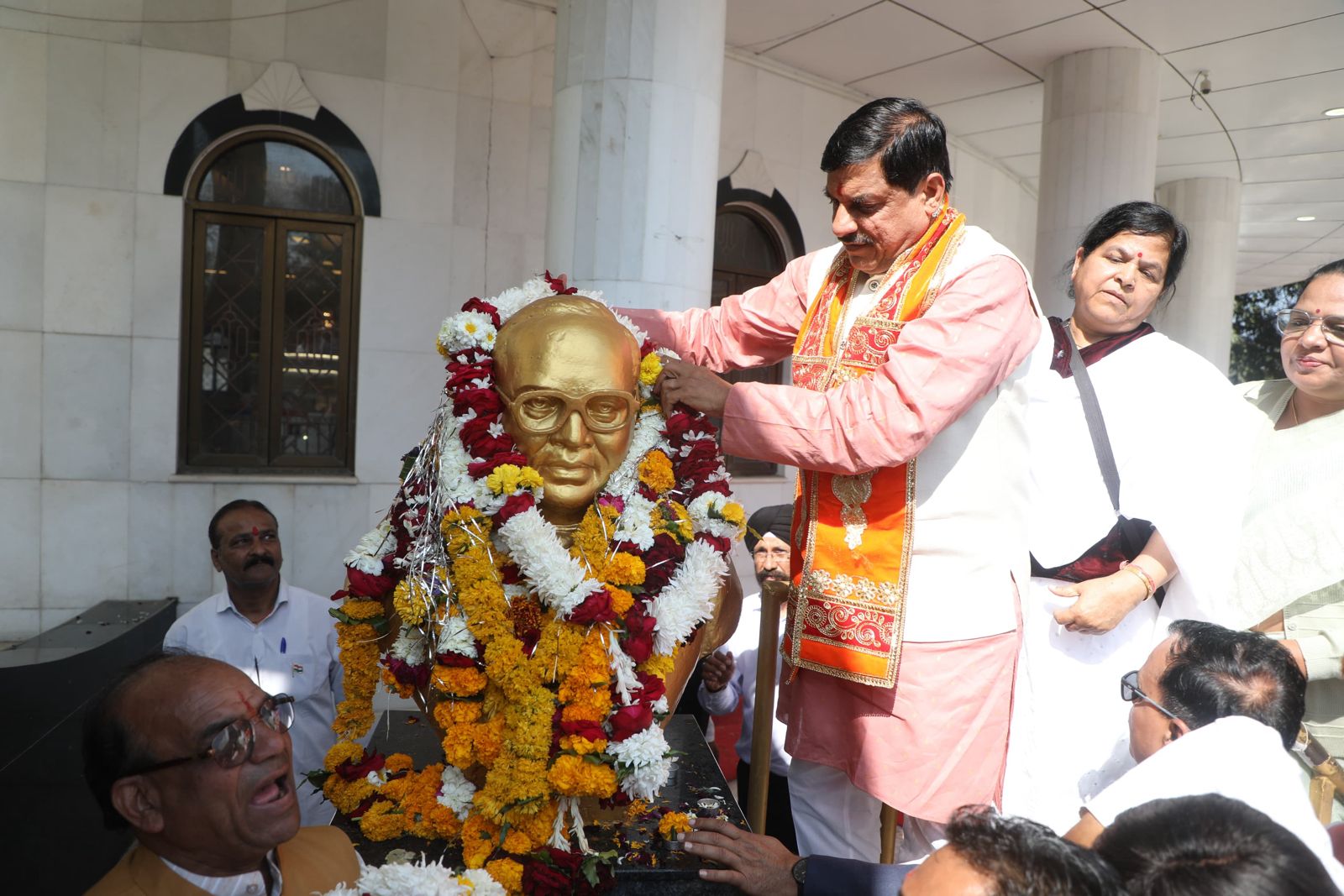 Mohan Yadav hoisting flag in indore