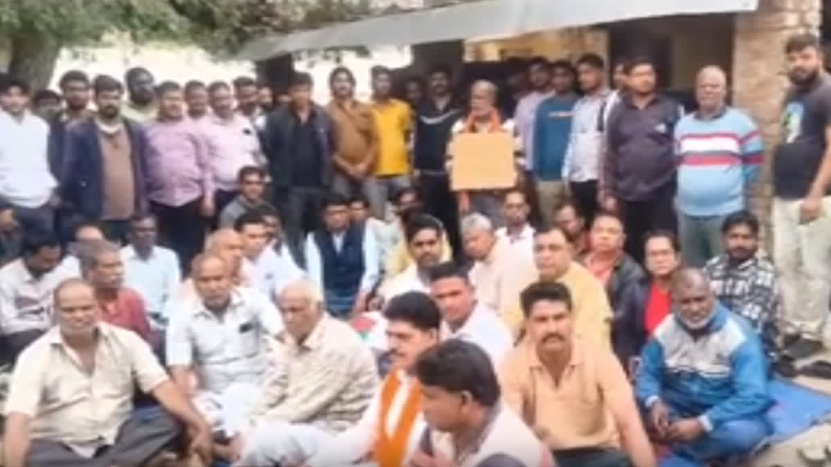 relatives of deceased staged a sit-in protest