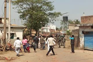 Security forces on the road in the aftermath of the clash.