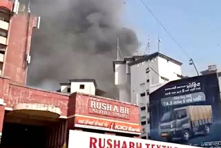 Smoke rising after a fire broke out in Surat's textile market