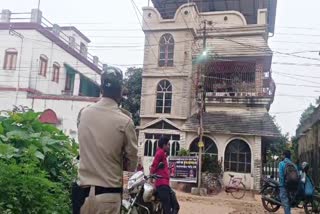 Police in front of Sutandra Chatterjee's house in Chandannagar