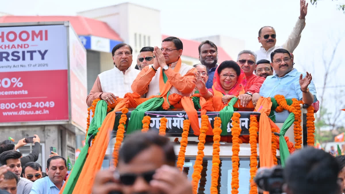 Uttarakhand Chief Minister Pushkar Singh Dhami participated in a road show with Tehri Lok Sabha candidate Mala Rajyalakshmi Shah in Dehradun on Tuesday.