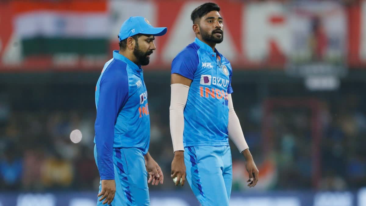 Mohammed Siraj and Rohit Sharma