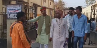 A video of a groom dressed in wedding attire reaching a polling station in Rajasthan along with his family and 'Baraat' to cast the vote has come to the surface.