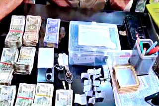 WEAPONS AND CASH RECOVERED