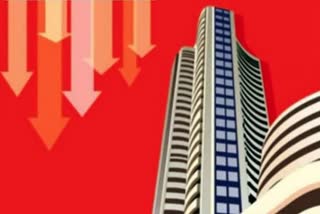 Sensex ends marginally lower