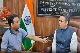 Deputy Commissioner Srinagar, Dr Bilal Mohi-ud-din Bhat (Right) speaking to ETV Bharat's Parvez-ud-Din on Wednesday.