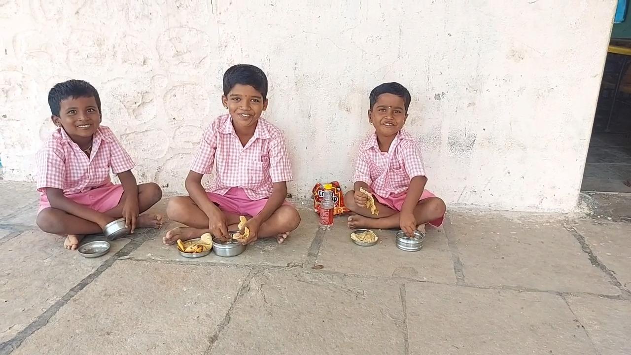 Woman Sarpanch teaching students