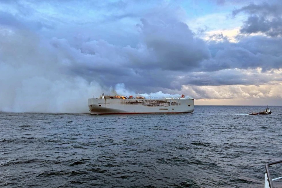 ship with cars burning in atlantic