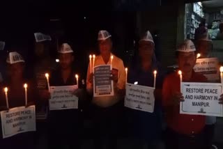 Nalbari AAP hold a candle march over manipur incident