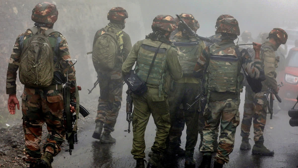 Security personnel conduct a search operation in Jaddan Bata village after the recent terror attack, in Doda on July 18.