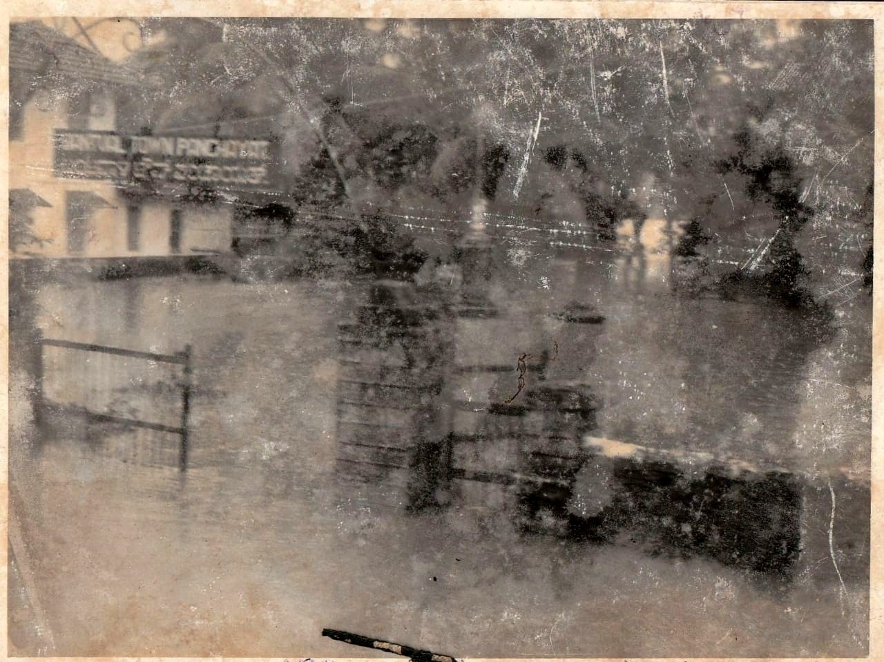 Black and white photos of the 1974 flood