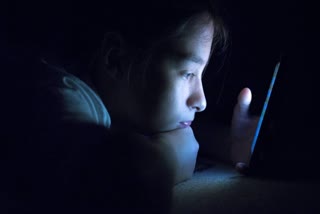 Yes, blue light from your phone can harm your skin. A dermatologist explains