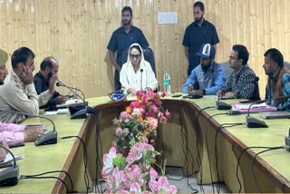 JK Waqf Board Chairperson Darakhshan Andrabi (M) during a meeting with Waqf officials