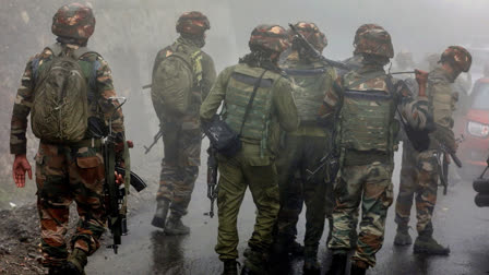 Security personnel conduct a search operation in Jaddan Bata village after the recent terror attack, in Doda on July 18.