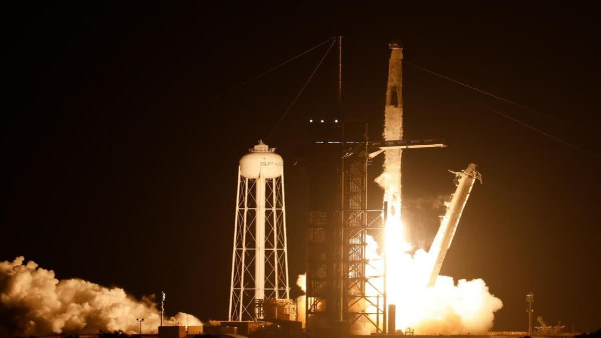 A SpaceX Falcon 9 rocket with the Crew Dragon spacecraft with astronauts on a mission to the International Space Station lifts off from pad 39A at Kennedy Space Center in Cape Canaveral,