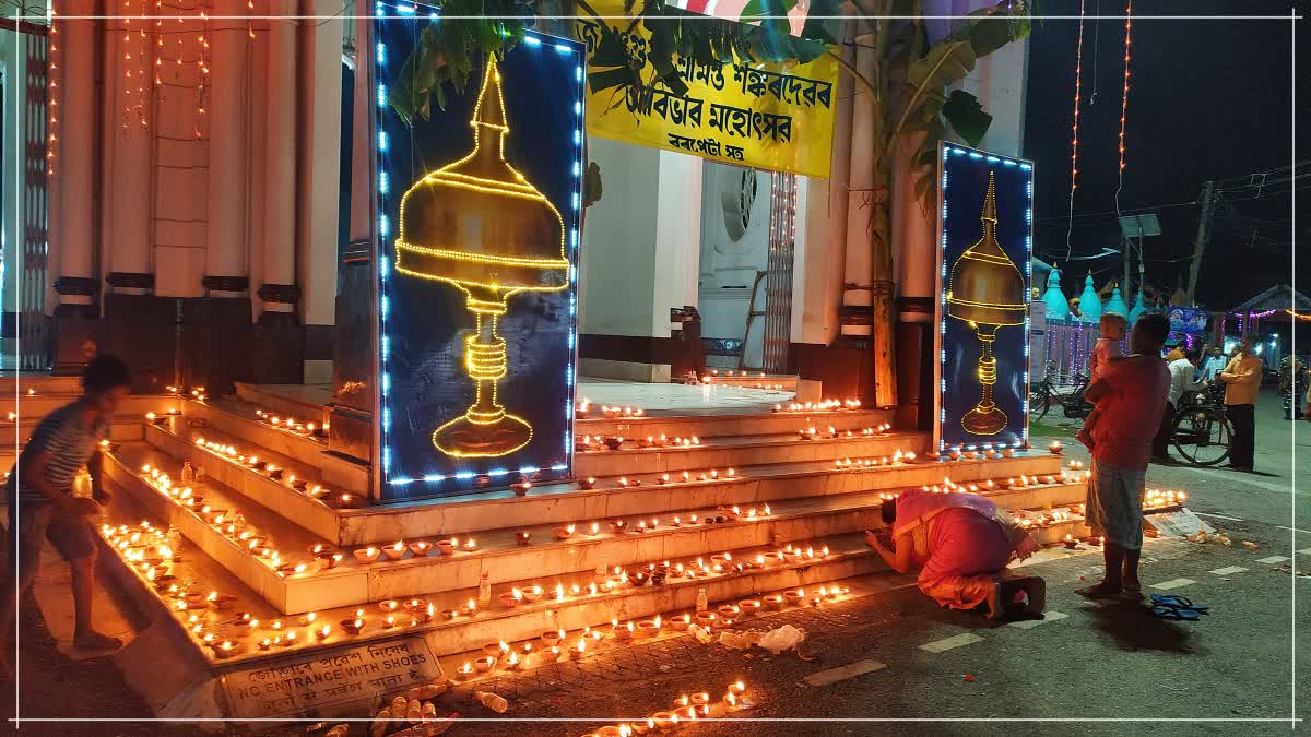 Lighting a lamp at Barpeta Satra