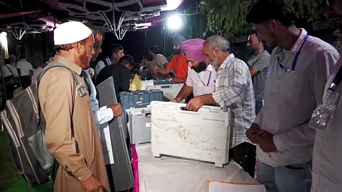 Polling officials seal the Electronic Voting Machines (EVMs) and Verifiable Paper Audit Trail (VVPATs) after the conclusion of the second phase of the Jammu and Kashmir Assembly elections, in Poonch on Wednesday.