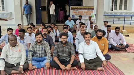 Village administrators sit- in