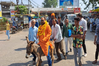 CANDIDATES NOMINATION IN UNIQUE STYLE NOMINATION THROUGH BULLOCK CART DONKEY AND SCOOTY IN MP ELECTION 2023