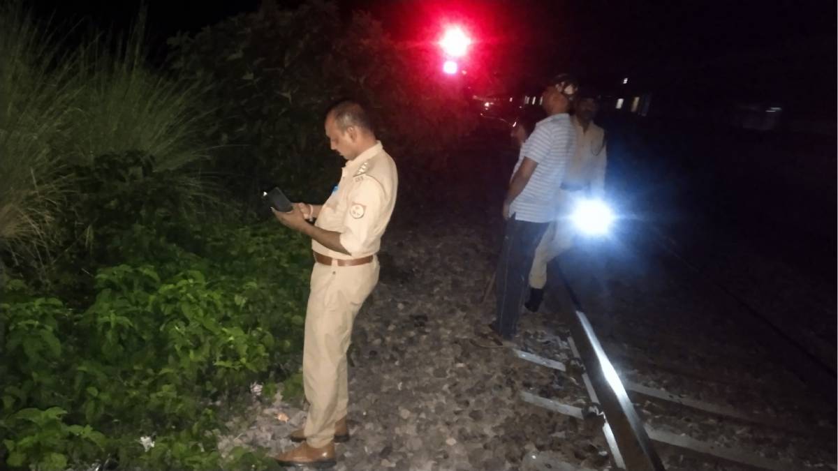 A police official inspects the spot