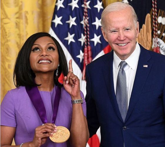 Mindy Kaling receiving the National Medal of the Arts by US President Joe Biden