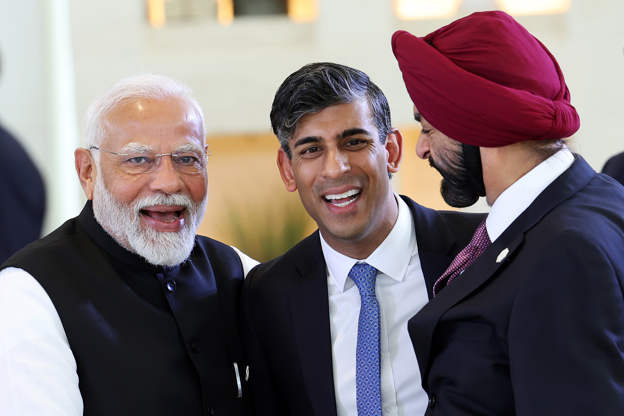 UK PM Rishi Sunak flanked by India PM Narendra Modi and World Bank President Ajay Banga at the G7 Outreach Summit in Apulia