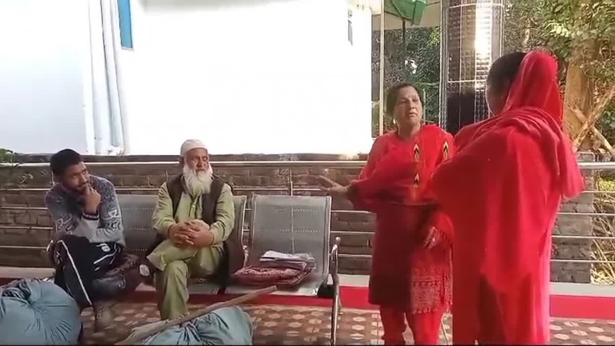 A videograb of a Himachal woman (second from right) is seen asking two Kashmiri Shawl sellers to leave the state. The woman said to be from Surjanpur Village, in Kangra District of Himachal