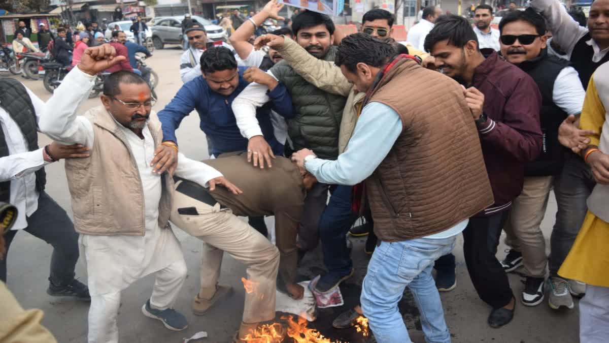 Policeman's uniform caught fire during Congress' effigy burning programme