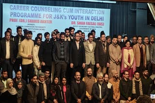 Deputy Secretary in the Union Culture Ministry, Shah Faesal (C) posing for a group photograph at a career counseling programme in New Delhi on Saturday, Jan 27, 2024