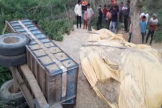 Chaff laden tractor trolley overturned