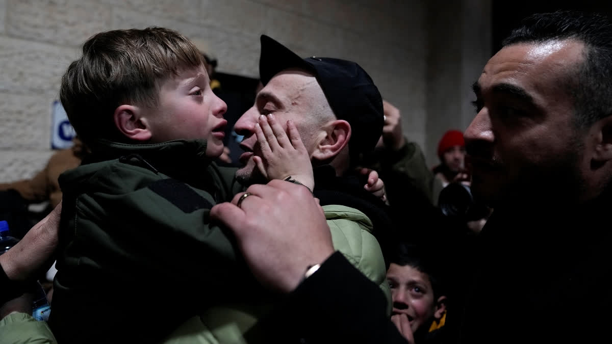 Palestinian prisoners are greeted after being released from Israeli prison following a ceasefire agreement between Israel and Hamas, in the West Bank city of Ramallah, Thursday, Feb. 27, 2025.