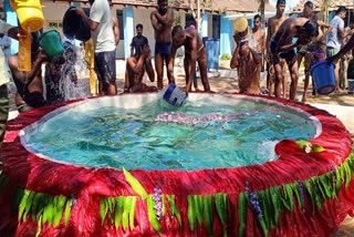 Authorities at Chhindwara district jail in Madhya Pradesh take the holy dip in the Ganga water brought from Triveni Sangam