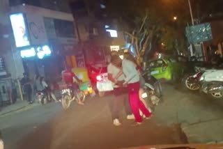 a-young-woman-beat-up-a-young-man-in-the-middle-of-the-road-while-drunk
