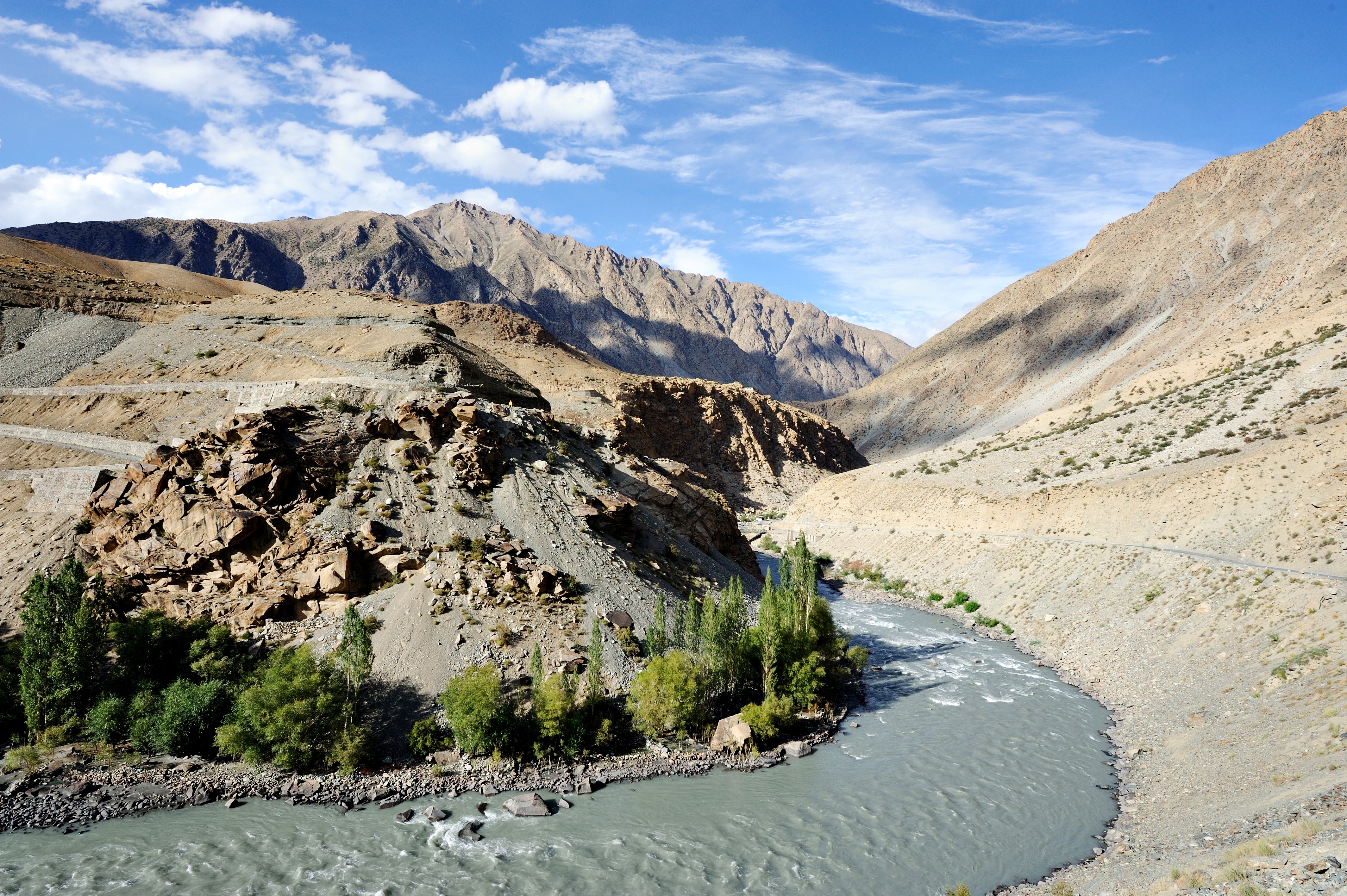 The road between Srinagar to Kargil along the border with Pakistan, river Indus in Kashmir on July 07, 2013, India