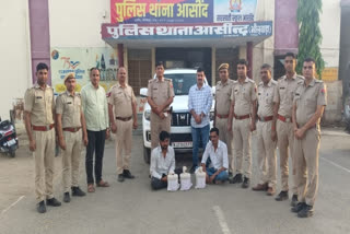 Smuggling accused and seized vehicles in custody of Asind Police