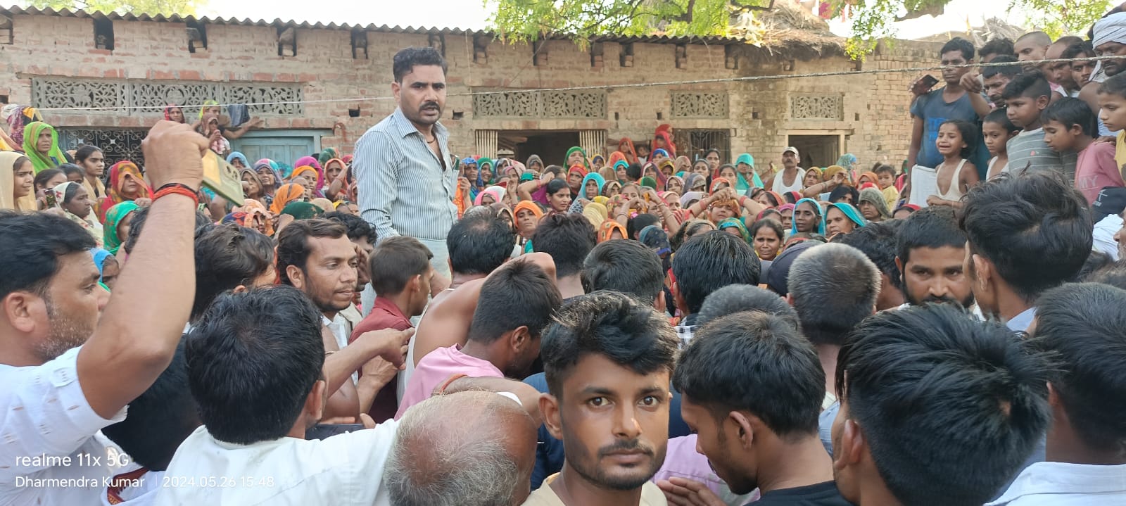 Locals at Barajetha village mourn the death of 12 people Killed in Shahjahanpur Accident in Uttar Pradesh, on Sunday May 26, 2024